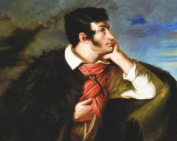 Portret młodego mężczyzny w czarnej, futrzanej narzucie i czerwonej chuście, symbolizujący romantyzm w Polsce.